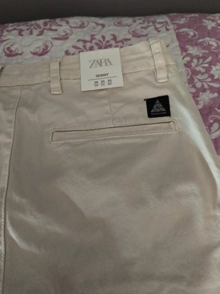 Pantalón Zara pinza beige talla 38