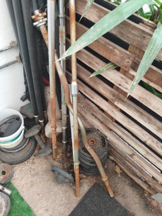 Pesas, discos y barras de gimnasio