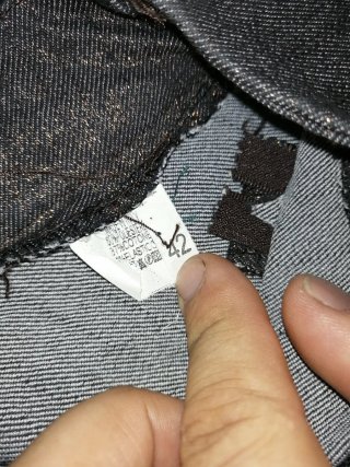 Pantaloni donna neri con dettagli oro