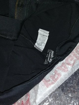 Pantaloni donna neri con dettagli oro