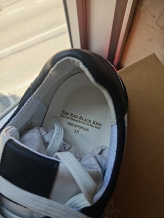 Tenis caballero negro y blanco