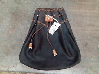 Bolsa de piel para ojeo