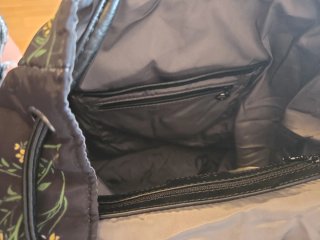 Mochila Desigual floral negra y multicolor
