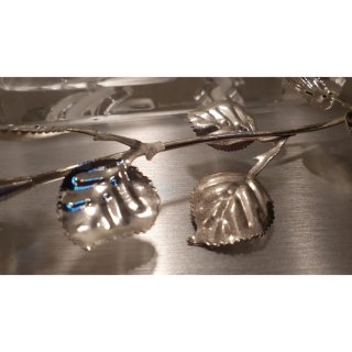 Rosa Blu bagnata in argento.