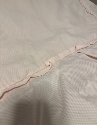 Colcha y chichonera de cuna rosa