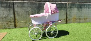 Cochecito de muñecas rosa