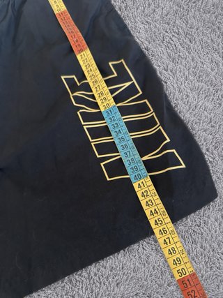 Calções Nike Dri-FIT pretos e dourados