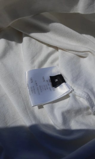 Top Givenchy Paris con plumas y pedrería – Talla M