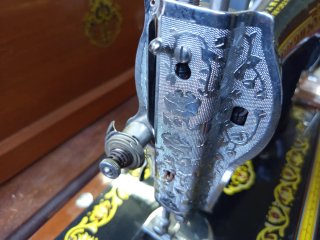 Máquina de coser antigua Popue