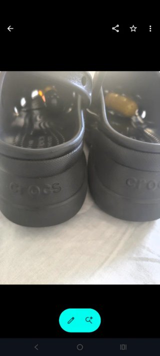 Crocs negras de suelta alta (doble suela).cómo nue