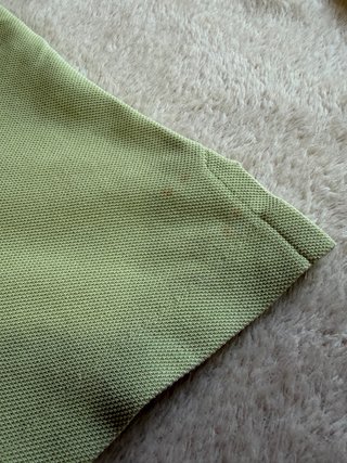 Polo sin mangas Lacoste verde lima