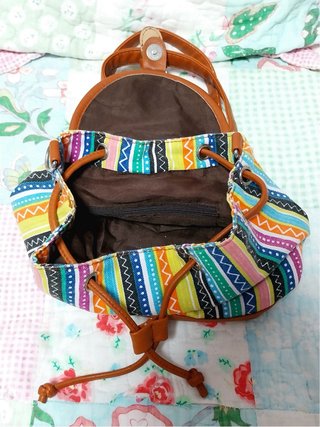 Mochila pequeña cuero y tela multicolor