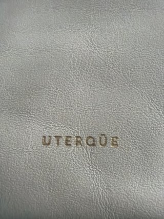 Bolso Uterqüe piel crema herrajes dorados