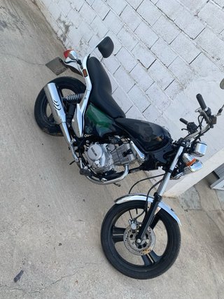 Daelim 125 VS Evolution Negra