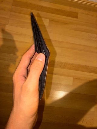 CARTERA negra de cuero de la marca JAGUAR