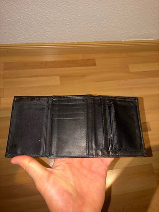 CARTERA negra de cuero de la marca JAGUAR