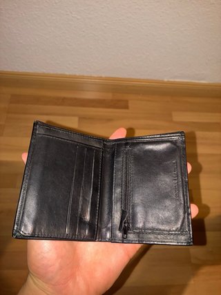 CARTERA negra de cuero de la marca JAGUAR