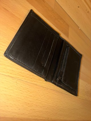 CARTERA negra de cuero de la marca JAGUAR