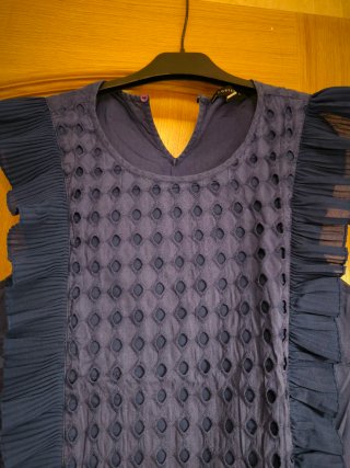Camisa azul con volantes