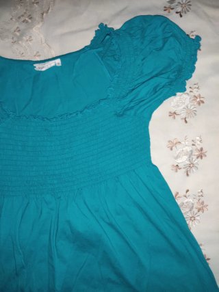 Blusa azul con fruncido