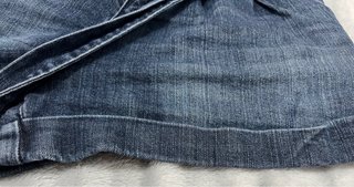 Pantalón corto vaquero con cinturón