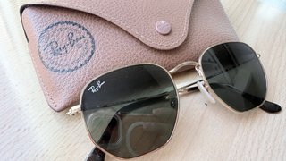 Gafas de sol Ray-Ban doradas y marrones