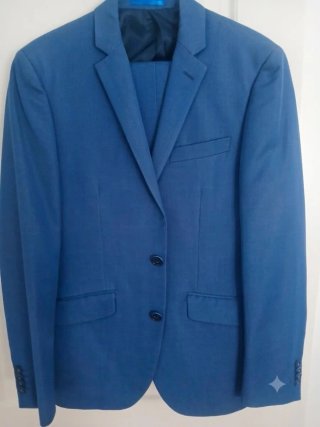 Traje azul chaqueta y pantalón