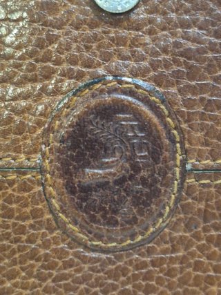 Cartera monedero de cuero marrón