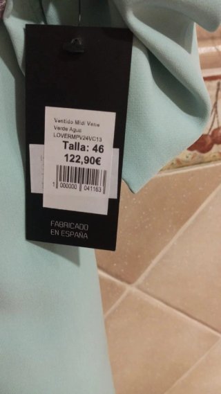 Vestido azul con cinturón dorado