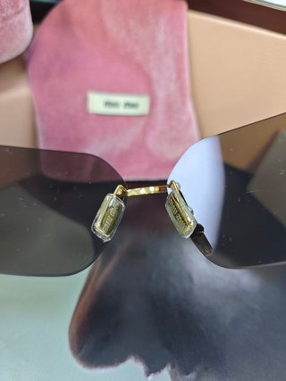 Gafas de sol Miu Miu Marrón y Dorado