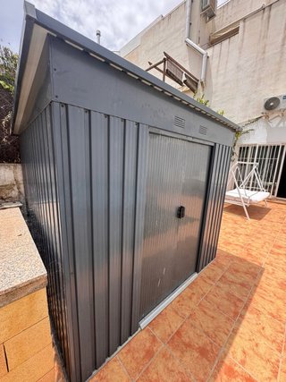 Caseta metálica exterior gris