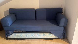 Sofá cama azul marino