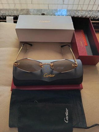 Occhiali da sole Cartier donna oro e marrone