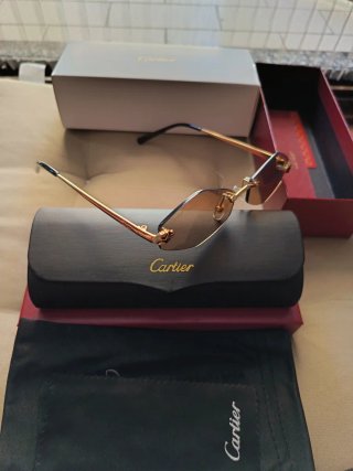 Occhiali da sole Cartier donna oro e marrone