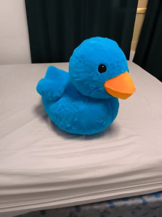 Pato de peluche grande azul