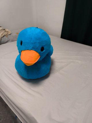 Pato de peluche grande azul