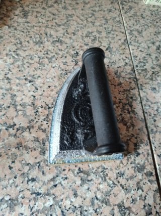 Plancha antigua de hierro
