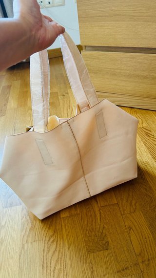 Bolso rosa nuevo sin usar