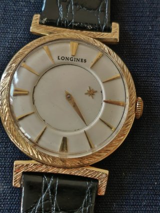 Reloj Longines Oro 14k mide 32 sin contar la coron