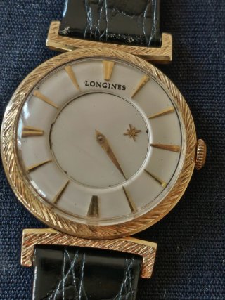 Reloj Longines Oro 14k mide 32 sin contar la coron