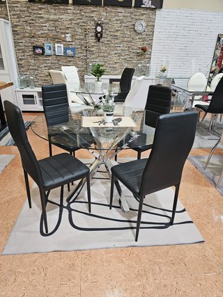 Mesa de cristal templado y 4 sillas negras