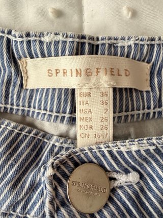 Pantalones cortos de rayas azules y blancas