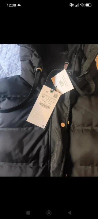 Chaleco acolchado negro con capucha
