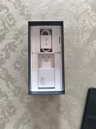 Xiaomi Mix Flip Caja y Teléfono