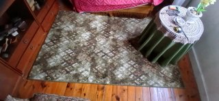 Alfombra verde rombos