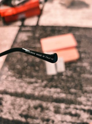 Gafas Miu Miu Doradas y Marrones