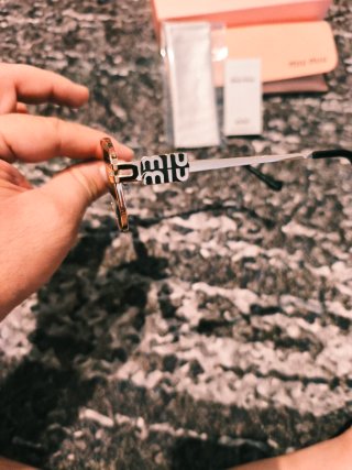 Gafas Miu Miu Doradas y Marrones