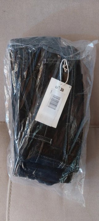 Bermudas vaqueras negras con pespuntes blancos