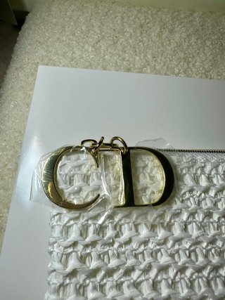 Pochette Dior bianca con logo