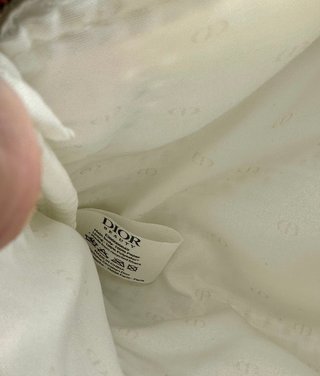 Pochette Dior bianca con logo
